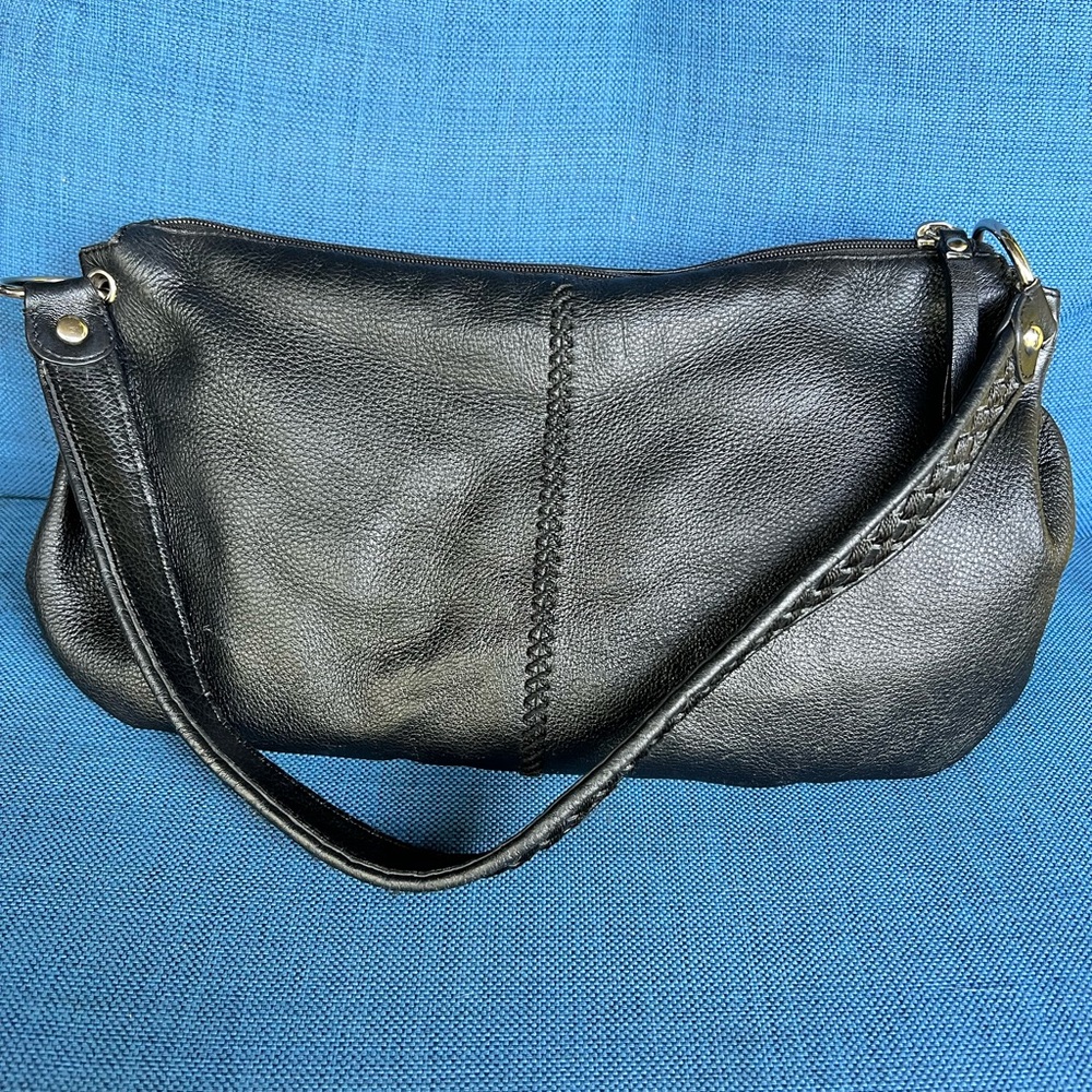 THE SAK genuine leather shoulder bag, in gently used condition and clean.